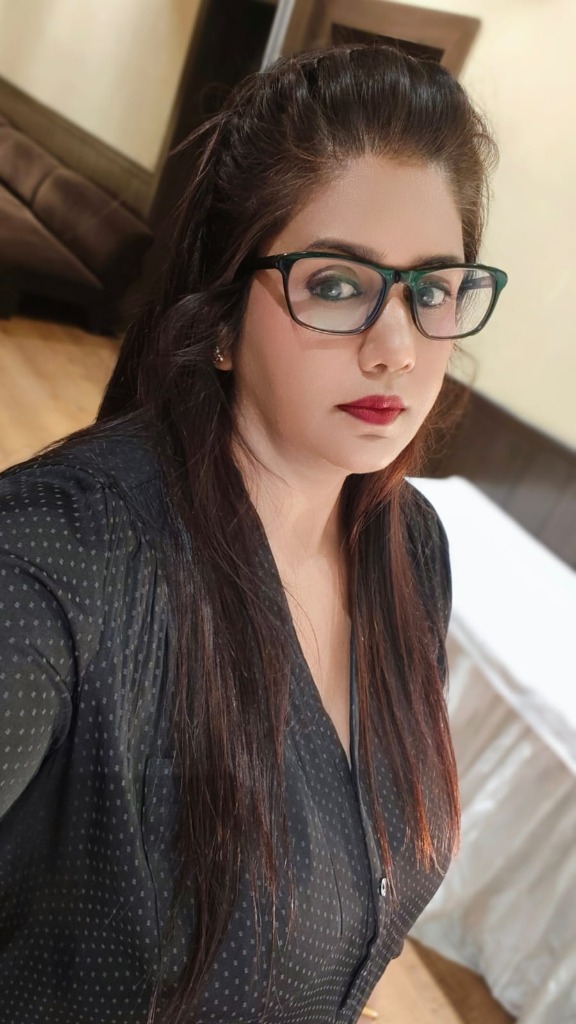 Rajni Mitra - Owner of Looks and Locks Jamshedpur standing in black suit
